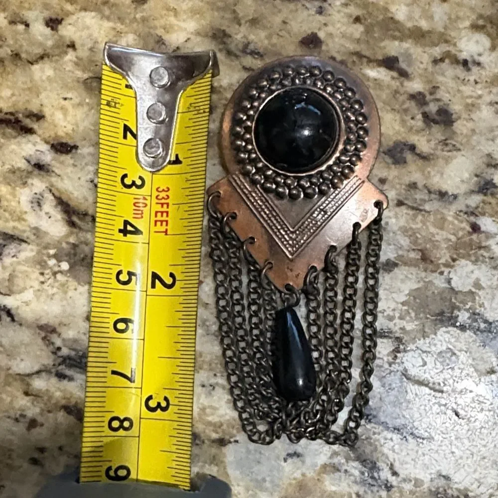 Artistic Black and Bronze Brooch with Chains